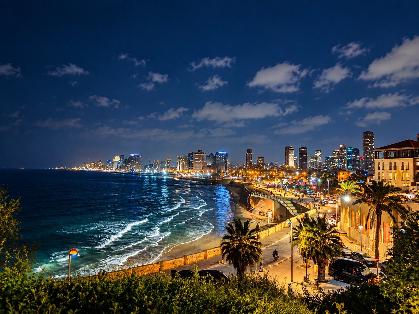 City skyline and seafront promenade at night